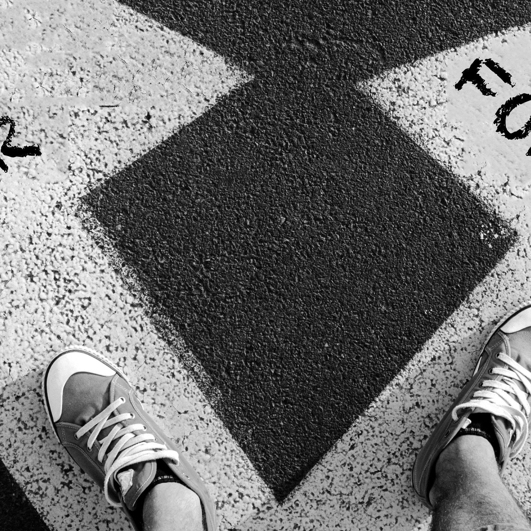 Mandeben på to pile. På den ene pil står der vaner. På den anden pil står der forandring.